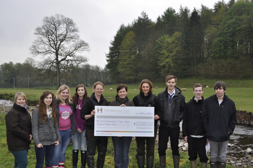 Holywood Trust presenting NCFT with a cheque for the Fishign for the Future Project