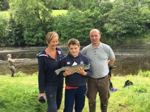 Rory with the blue trout caught on Slatehouse Loch (sneaky!)